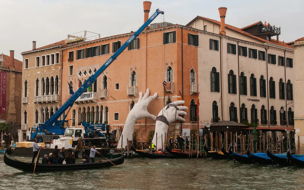 support by lorenzo quinn at 2017 venice biennale
